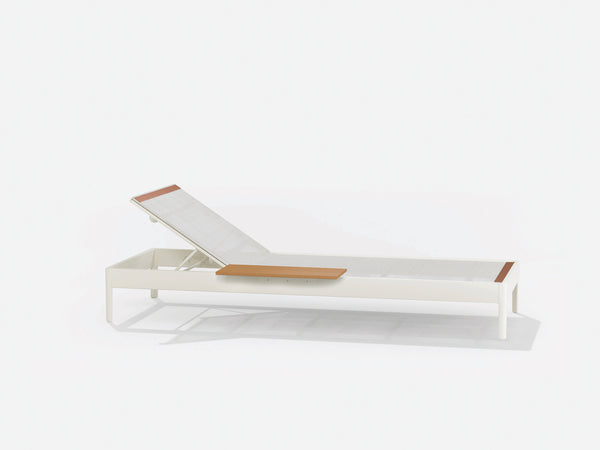 Sunlounger with small table on the right