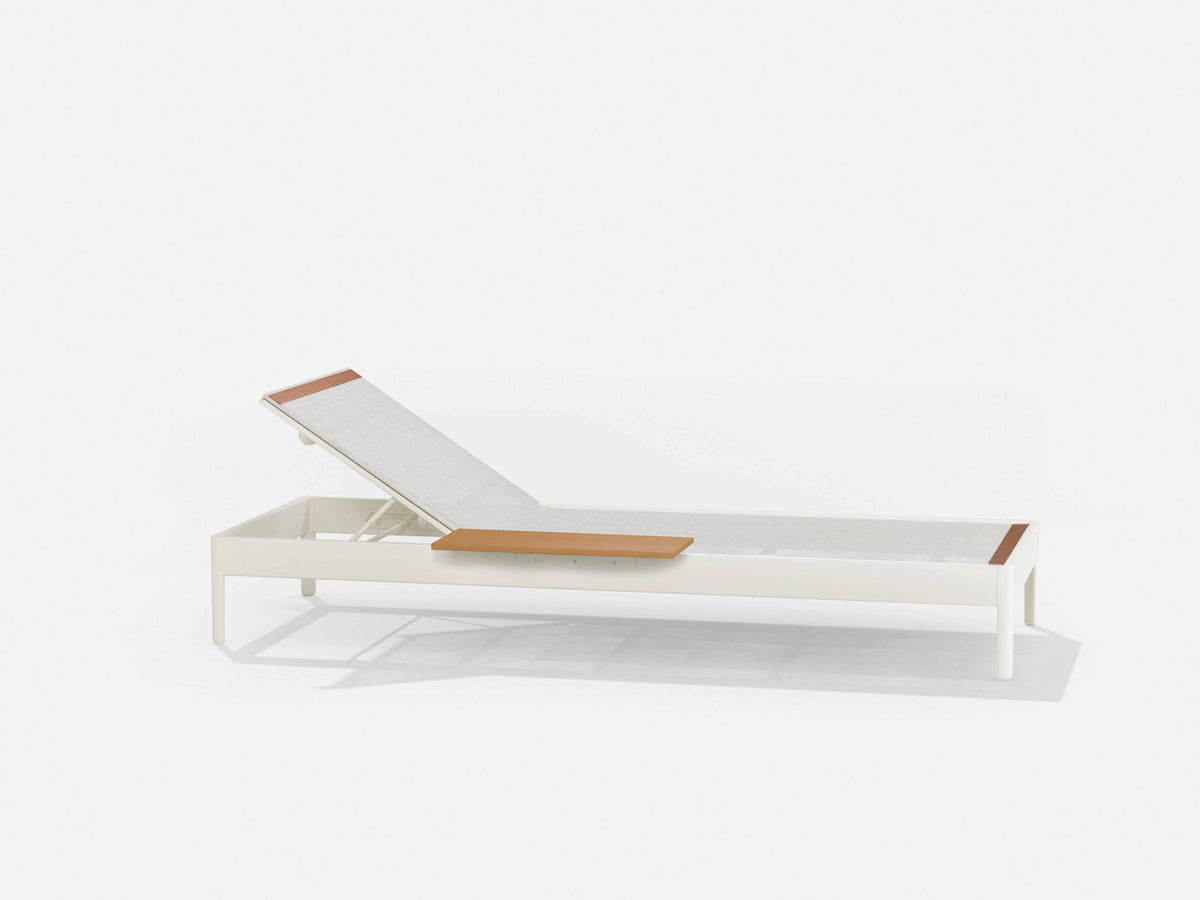 Sunlounger with small table on the right