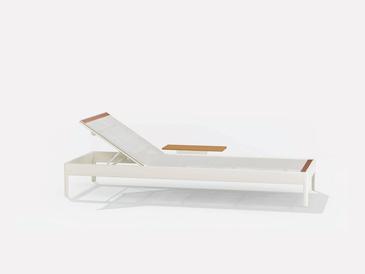 Sunlounger with small table on the left