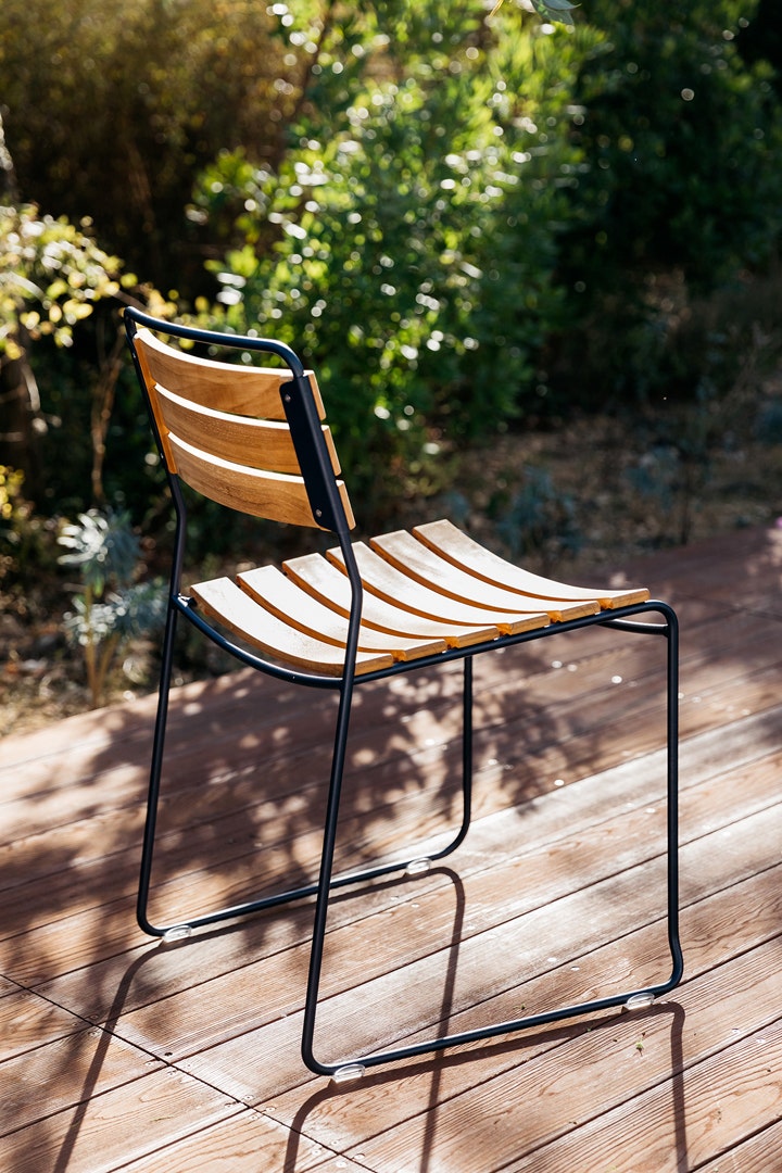 Striking teak chair