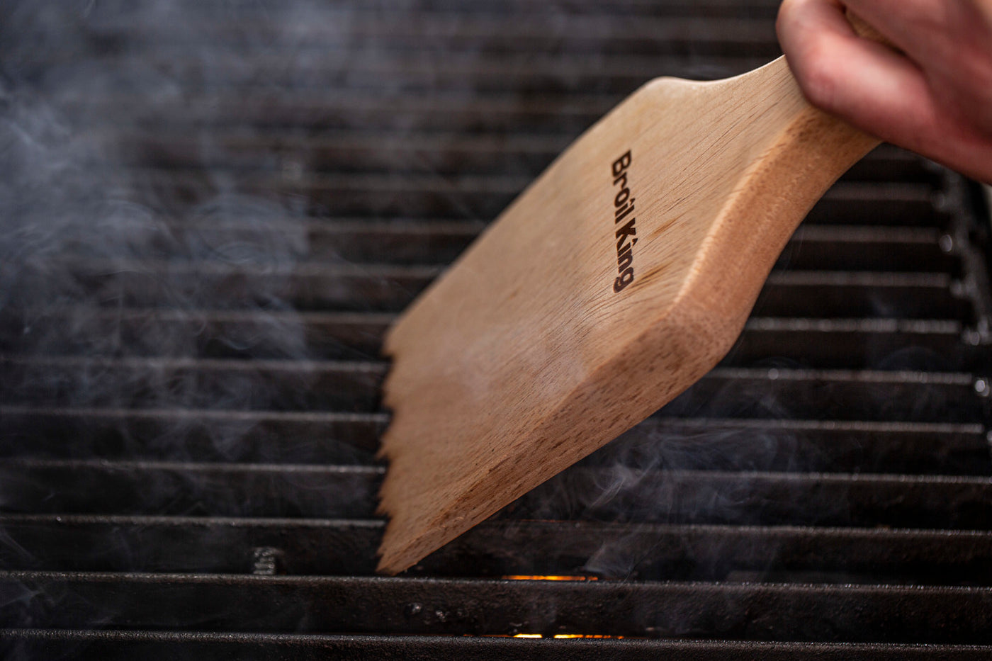 Houten barbecue schraper