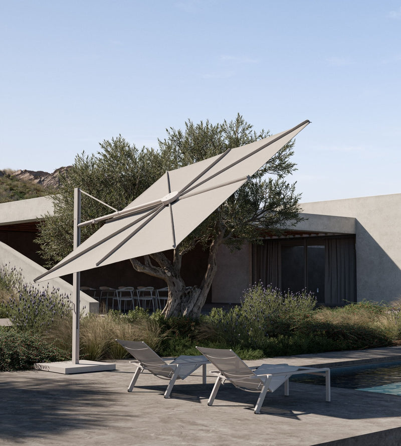 Solaz Parasol Tilted with Alura Sunloungers-min